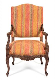 A Louis XV Style Fauteuil Height 44 inches.