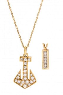 * A Collection of Yellow Gold and Diamond Pendants, 3.30 dwts.