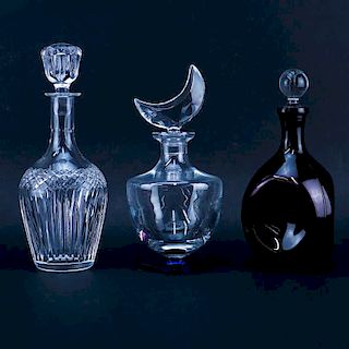 Grouping of Three (3) Vintage Decanters. Includes: Hawkes crystal, Sevres crystal, and amethyst gla
