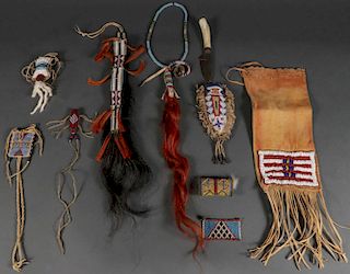 A GROUP OF NINE NATIVE AMERICAN BEADED ITEMS