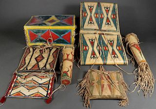 A GROUP OF POLYCHROME PARFLECHE CONTAINERS