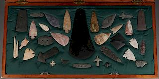THIRTY CASED STONE OBJECTS