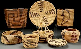 A GROUP OF EIGHT SOUTHWEST WOVEN BASKETRY ITEMS