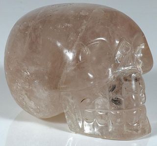 A CARVED QUARTZ CRYSTAL SKULL, PROBABLY CHINESE