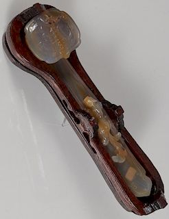 A CHINESE CARVED JADE RUYI SCEPTER