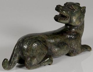 A LARGE CHINESE CARVED HARDSTONE SEATED TIGER