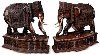 A  PAIR OF CARVED & INLAID ROSEWOOD ELEPHANTS