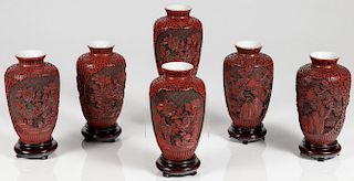 SIX CHINESE CARVED CINNABAR VASES