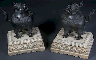 A PAIR OF CHINESE BRONZE FOO DOGS