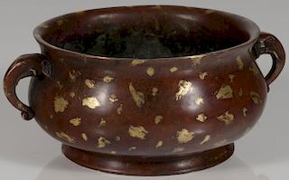 A CHINESE BRONZE AND GILT BOWL