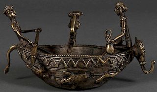 A DHOKRA BRONZE BOAT WITH FIGURES