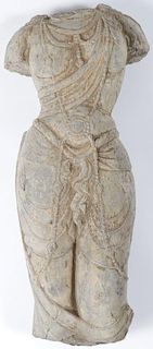 A CARVED OR CAST STONE? TORSO, IN ANCIENT STYLE.