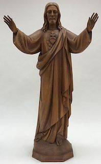 A CARVED WOOD FIGURE OF THE SACRED HEART OF CHRIS