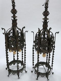 A PAIR OF WROUGHT IRON GOTHIC STYLE HANGING LAMPS