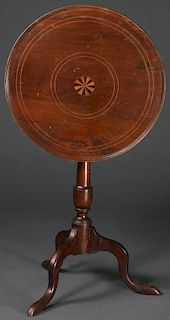 A CHIPPENDALE STYLE MAHOGANY TILT STAND