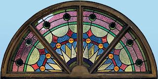 TWO STAINED AND LEADED GLASS LUNETTE WINDOWS