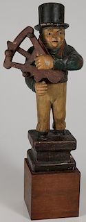 A CARVED AND POLYCHROME WOOD TRADE MARINER