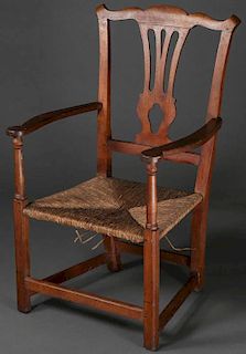 A CHIPPENDALE ARMCHAIR, NEW ENGLAND, 1765-1790