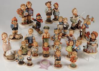 A GROUP OF 47 HUMMEL FIGURINES