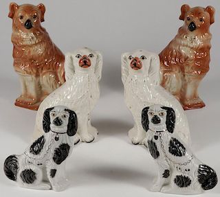 THREE PAIRS OF STAFFORDSHIRE STYLE DOGS