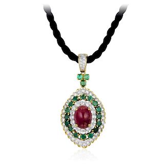 A Ruby Emerald and Diamond Pendant