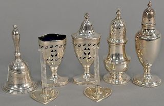 Seven piece sterling silver lot including containers with cobalt liners (one with cover), a pepper, a bell, a castor, two sma