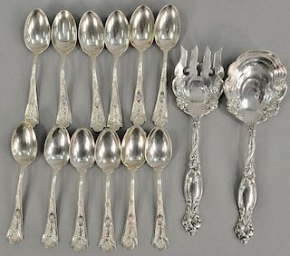 Fourteen piece sterling silver lot including two piece salad set and twelve bright cut spoons. 14.5 troy ounces