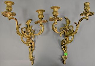 Pair of French two light brass sconces. ht. 15 1/2in., wd. 10 1/2in.   Provenance: The Estate of Thomas F Hodgman of Fairfiel