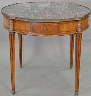 Louis XVI marble top table with two drawers and two slides. ht. 28 in., dia. 32 in.   Provenance: The Estate of Thomas F Hodg