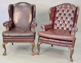 Three piece lot to include two leather upholstered wing chairs (one with replaced cushions over repaired seat) and three ligh