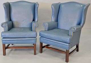 Leathercraft pair of blue leather Chippendale style wing chairs.