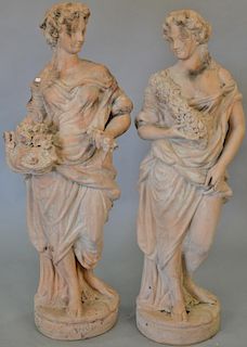 Pair of earthenware female figures. ht. 48 in. & 49 in.  Provenance: From the Estate of Faith K. Tiberio of Sherborn, Massach