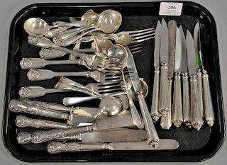 Sterling silver lot with six forks, five small ladles, five demitasse spoons, six cream soups, and fifteen knife handles. 20 