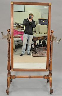 Victorian Cheval mirror with candle holders and ball and claw feet. ht. 71in.  Provenance: From the Estate of Faith K. Tiberi