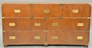 Baker campaign style chest. ht. 32 in., wd. 62 in.