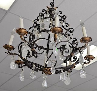 Rock crystal and iron chandelier with eight lights, approximate ht. 24in., dia. 24in. (Two bulbs as is)   Provenance: The Est