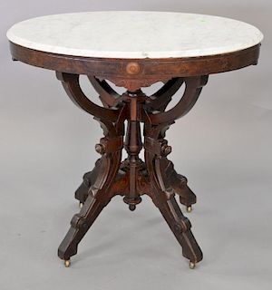 Victorian oval marble top table (small chips). ht. 29 in., top: 24" x 32"