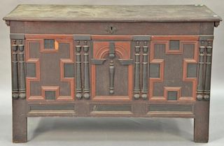 Oak lift top chest with molding and turnings on front. ht. 30 in., wd. 50 in.