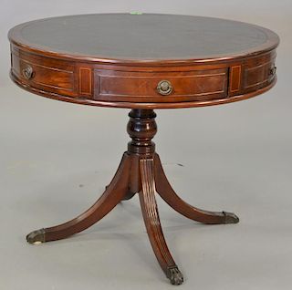 Mahogany drum table with leather revolving top and two drawers. ht. 29 1/2 in., dia. 36 in.
