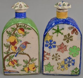 Pair of Persian ceramic hand painted bottles with stoppers marked: made in Iran Persia, Qajar pottery. ht. 8in.