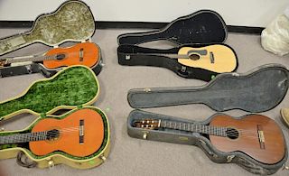 Four guitars in cases including Jose Ramirez, Ramirez Madrid, Contreras Classical guitar, and George Guitar.
