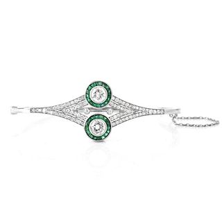 Art Deco style Approx. 2.50 Carat TW Diamond, Emerald and 18 Karat White Gold Hinged Bangle Bracele