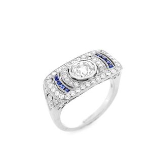 Art Deco style Approx. 1.01 Carat TW Diamond, .14 Carat Sapphire and Platinum Ring set in the Cente