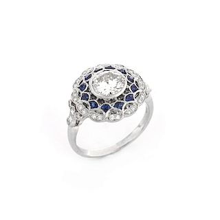 Art Deco style Approx. 1.09 Carat TW Diamond, .89 Carat Sapphire and Platinum Ring set in the Cente