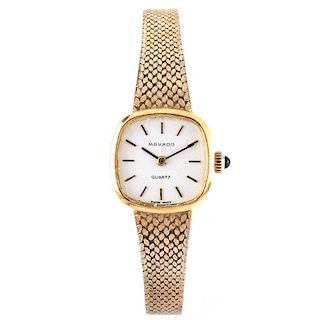 Lady's Vintage Movado 14 Karat Yellow Gold Bracelet Watch with Quartz Movement. Signed, stamped 585