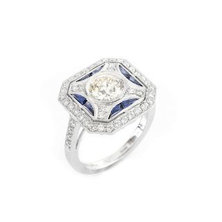 Art Deco style Approx. 1.51 Carat TW Diamond, .36 Carat Sapphire and Platinum Ring set in the Cente