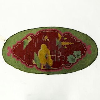 Chinese Nichols Rug: Oval shape with green and red colors. Fading, fraying to edges, dirty, needs c