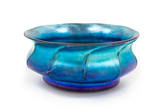 Tiffany Studios, EARLY 20TH CENTURY, a Favrile glass bowl, of low form, decorated with blue iridescence
