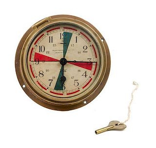 * An English Brass Cased Ship's Bulkhead Clock Diameter of face 5 3/4 inches.