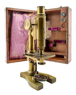 * A French Brass Microscope Height 10 1/2 inches.
